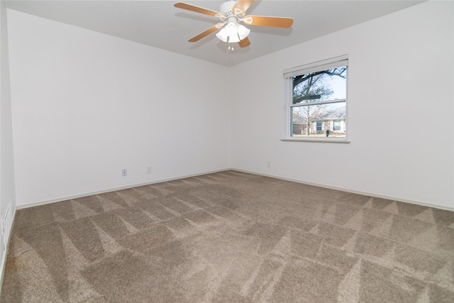 unfurnished room featuring carpet floors and ceiling fan