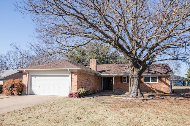 ranch-style home featuring a garage