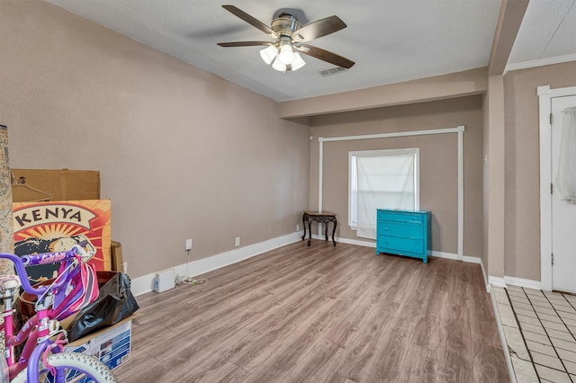 interior space featuring ceiling fan and light hardwood / wood-style floors