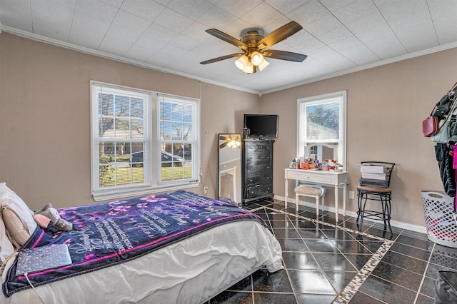 bedroom with ceiling fan and ornamental molding