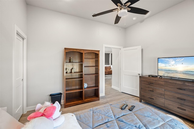 bedroom featuring ceiling fan and light wood-type flooring