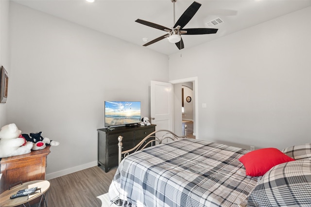 bedroom with ceiling fan and light hardwood / wood-style flooring