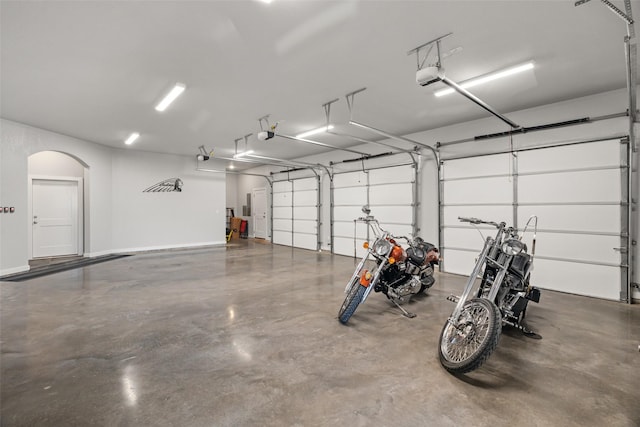 garage featuring a garage door opener