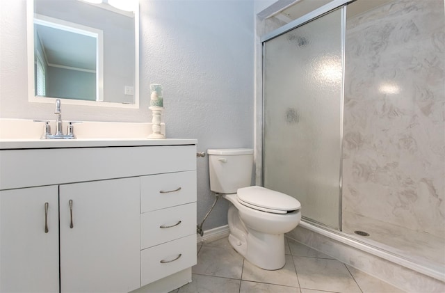 bathroom with vanity, an enclosed shower, tile patterned floors, and toilet