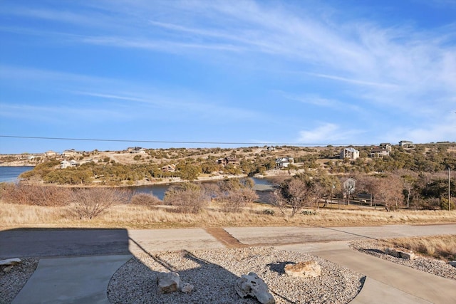 view of yard featuring a water view