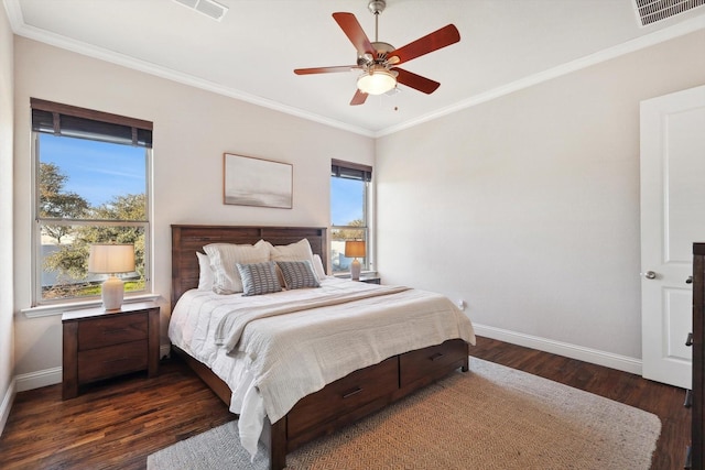 bedroom with ornamental molding, dark hardwood / wood-style floors, and ceiling fan