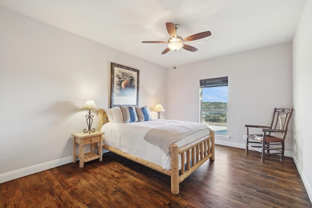 bedroom featuring dark wood-type flooring and ceiling fan