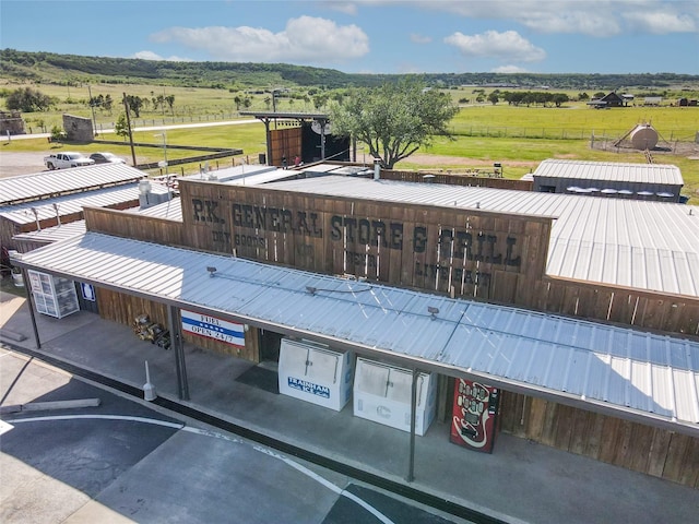 view of building exterior with a rural view