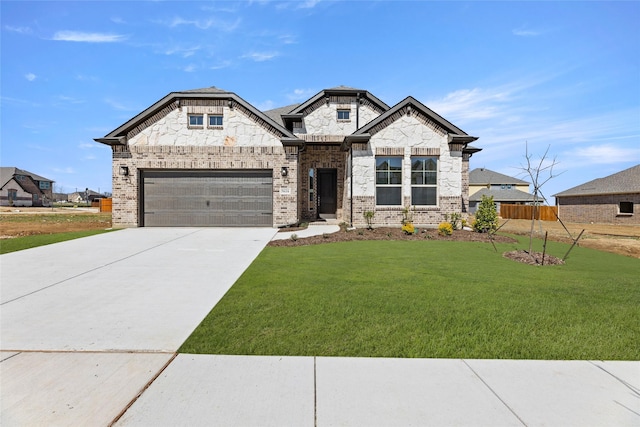 french provincial home with driveway, brick siding, a front yard, and fence