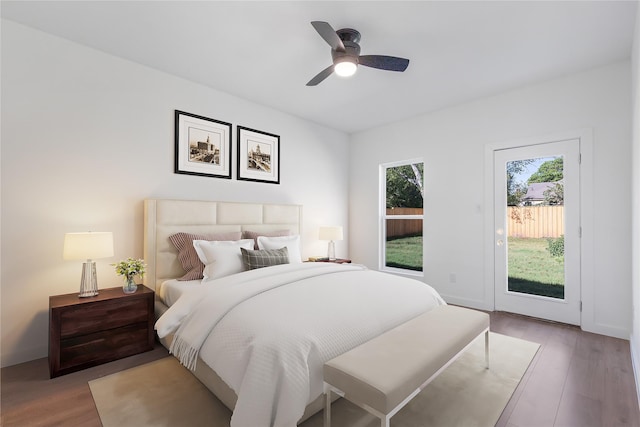 bedroom featuring ceiling fan, access to outside, and light hardwood / wood-style floors