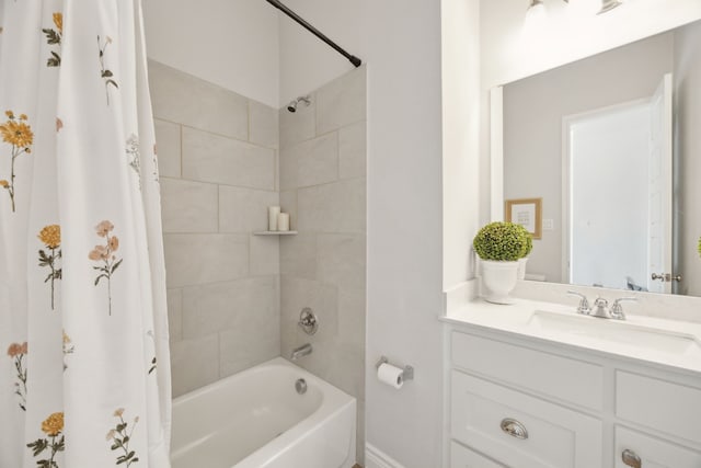 bathroom with vanity and shower / bath combo