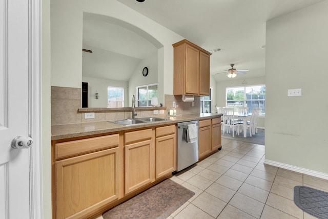 kitchen with light brown cabinetry, dishwasher, sink, light tile patterned floors, and ceiling fan