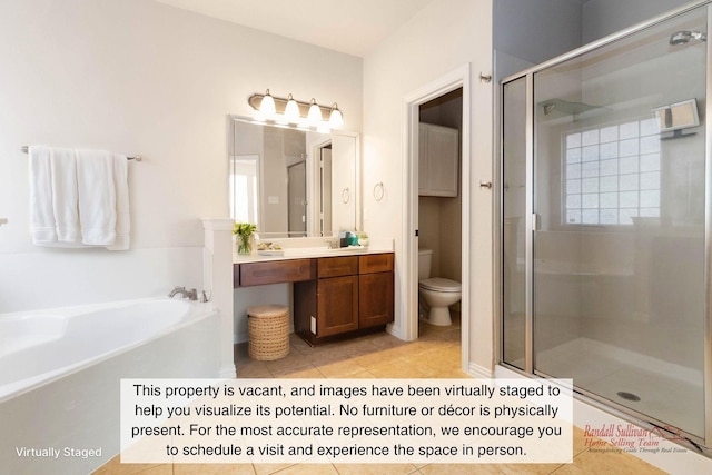 full bathroom with tile patterned floors, toilet, separate shower and tub, and vanity