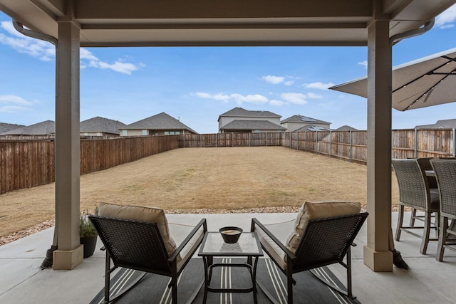 view of patio / terrace with a fire pit