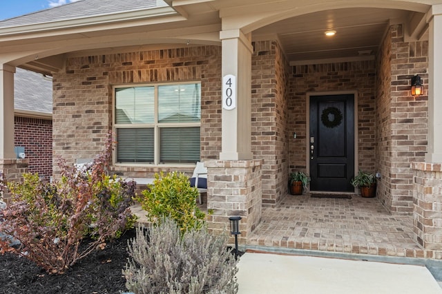 property entrance with a porch