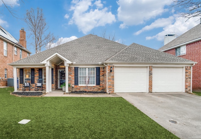 view of front of property featuring a porch, a garage, cooling unit, and a front lawn