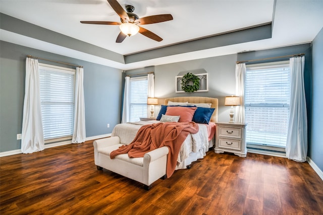 bedroom featuring dark wood-type flooring and ceiling fan