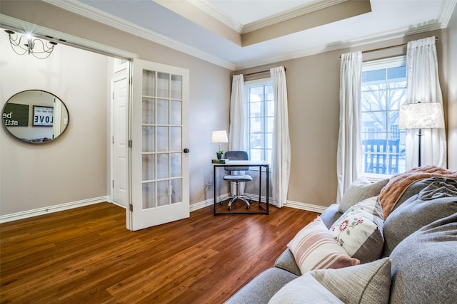 sitting room featuring crown molding, dark hardwood / wood-style floors, and a raised ceiling