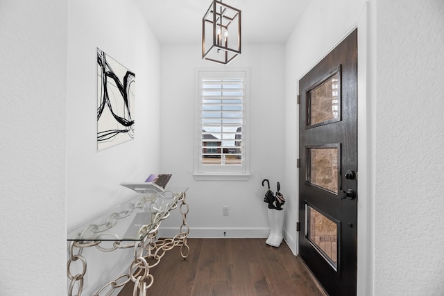 interior space with dark hardwood / wood-style flooring