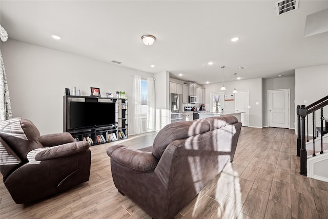 living room featuring light hardwood / wood-style floors