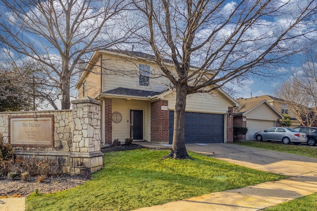 view of front of property with a garage and a front lawn