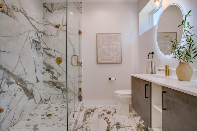 bathroom with vanity, toilet, and walk in shower