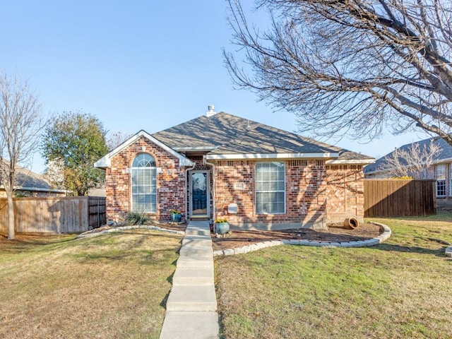 view of front of home featuring a front yard