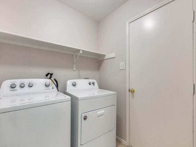 laundry room featuring washer and clothes dryer