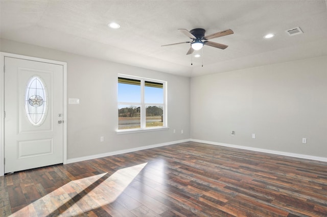 entryway with ceiling fan and dark hardwood / wood-style flooring