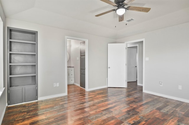 unfurnished bedroom featuring dark hardwood / wood-style flooring and ceiling fan