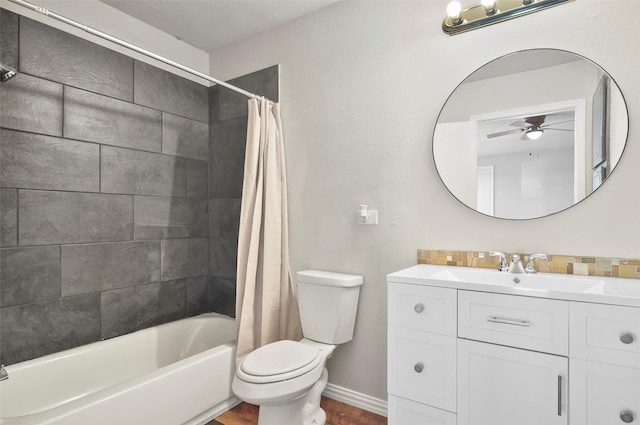 full bathroom featuring hardwood / wood-style flooring, vanity, shower / tub combo, ceiling fan, and toilet