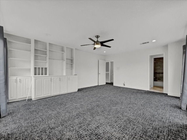 unfurnished living room with ceiling fan and carpet floors