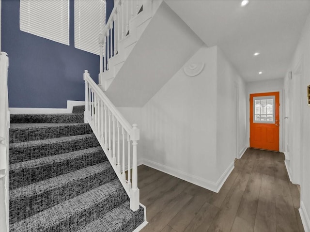 stairway with wood-type flooring