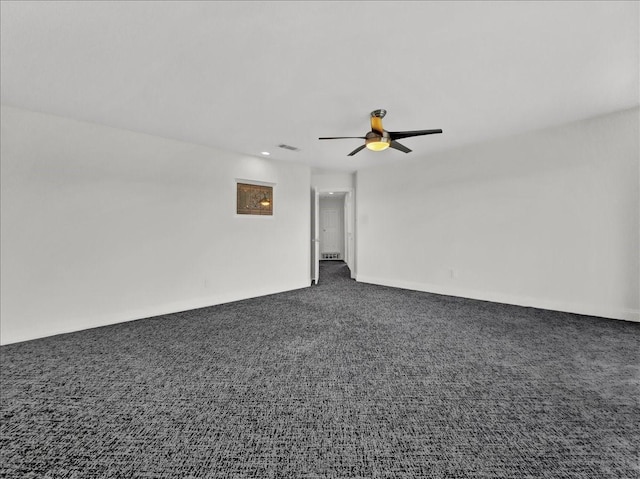 carpeted empty room with ceiling fan