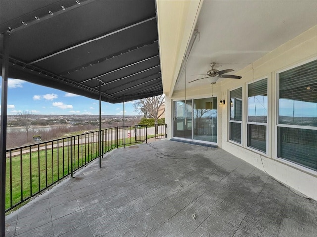 view of patio / terrace featuring ceiling fan