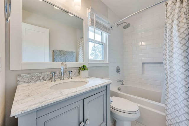 full bathroom featuring vanity, toilet, and shower / bath combo with shower curtain