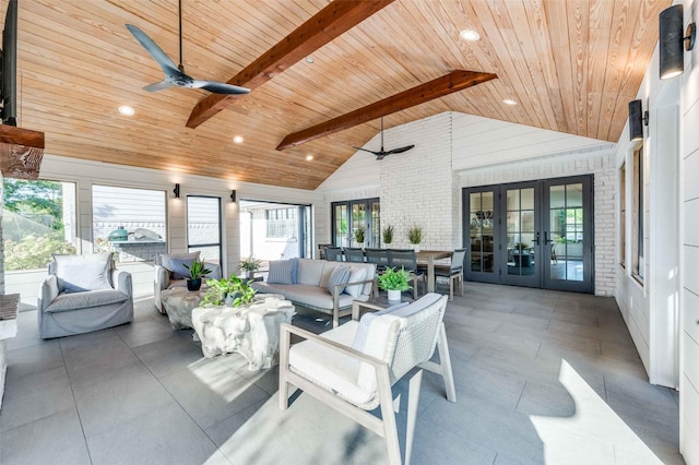 sunroom / solarium with french doors, ceiling fan, wood ceiling, and lofted ceiling with beams