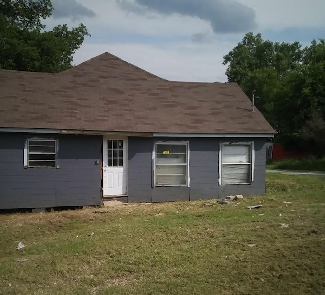 exterior space with a lawn