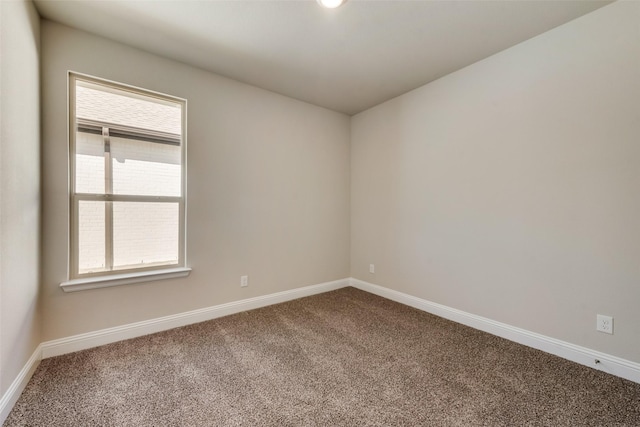 view of carpeted spare room