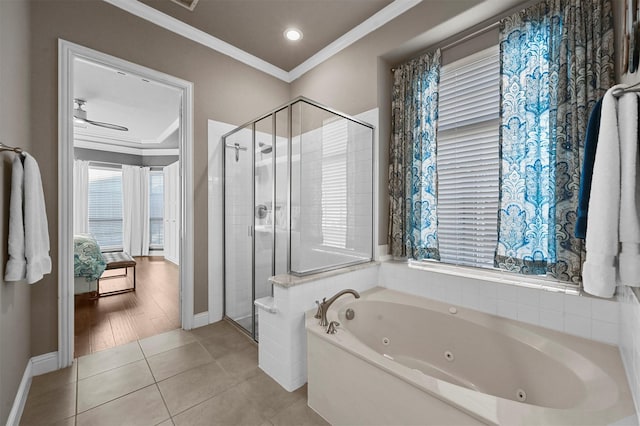 bathroom with ornamental molding, a stall shower, a whirlpool tub, baseboards, and tile patterned floors