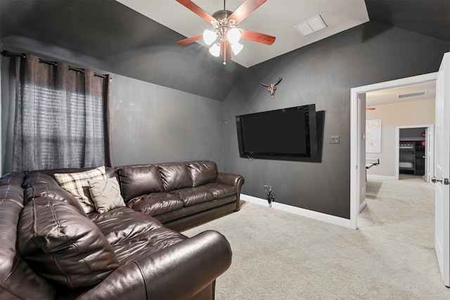 living area featuring lofted ceiling, carpet flooring, and baseboards