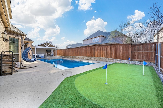 view of pool with a fenced in pool, a patio area, and a fenced backyard