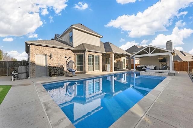 view of swimming pool featuring a patio area, a fenced backyard, an outdoor living space, and a fenced in pool