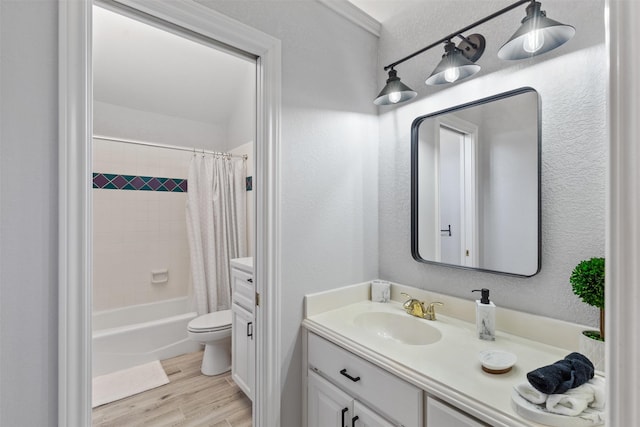 full bathroom with wood-type flooring, toilet, vanity, and shower / tub combo with curtain