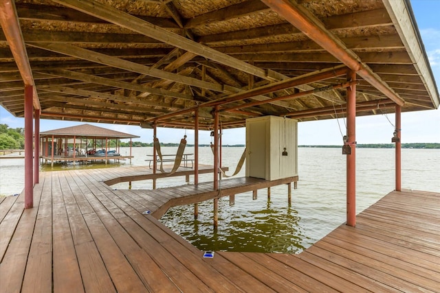 view of dock with a water view