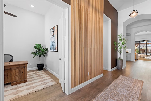 hall with light hardwood / wood-style flooring