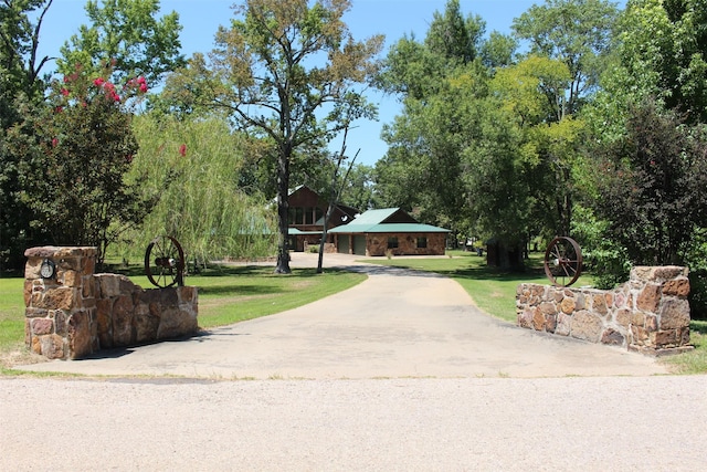 view of community with a yard