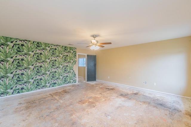 spare room featuring ceiling fan