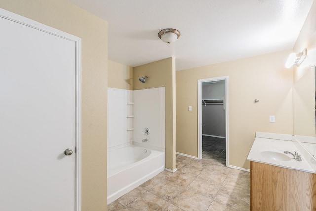 bathroom with vanity,  shower combination, and tile patterned flooring