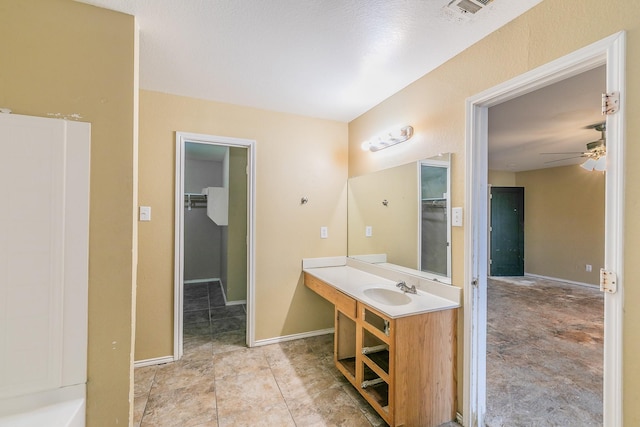 bathroom with vanity and ceiling fan